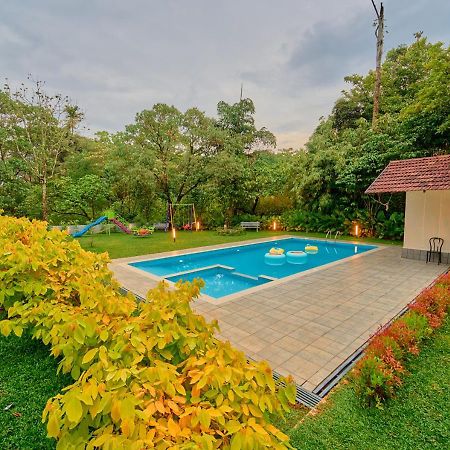 Glen Castle Vagamon Pool Resort By Voye Homes Esterno foto