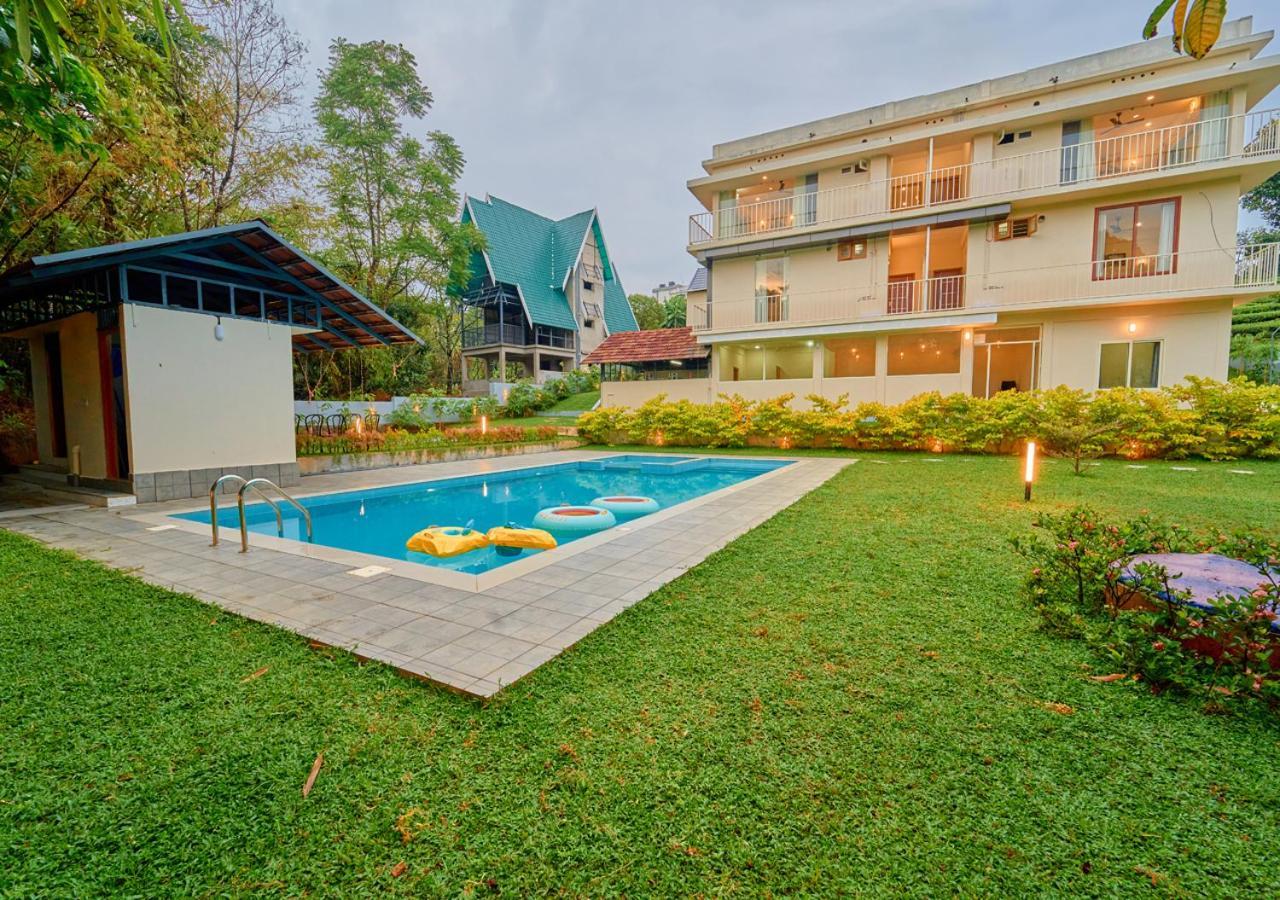 Glen Castle Vagamon Pool Resort By Voye Homes Esterno foto