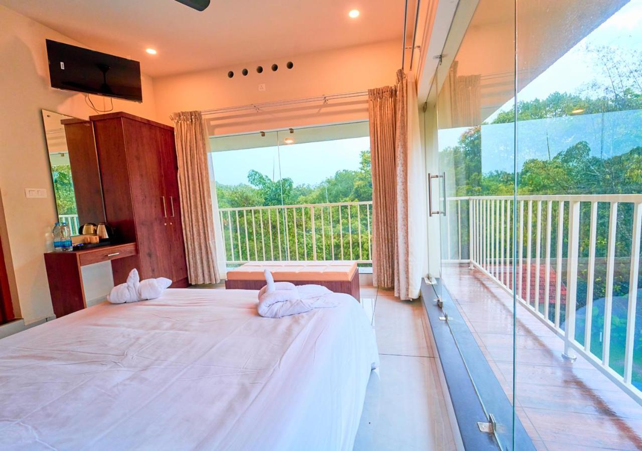 Glen Castle Vagamon Pool Resort By Voye Homes Esterno foto