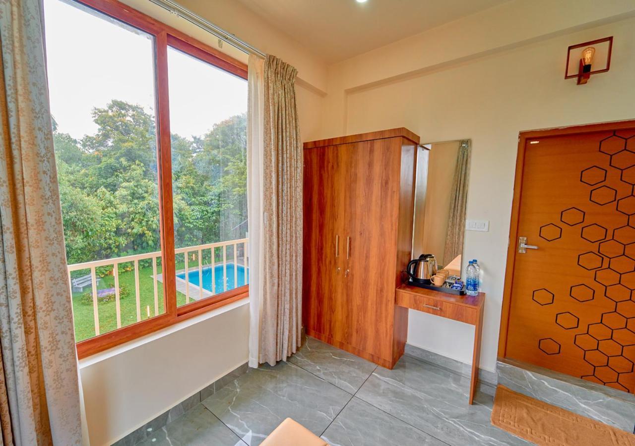 Glen Castle Vagamon Pool Resort By Voye Homes Esterno foto