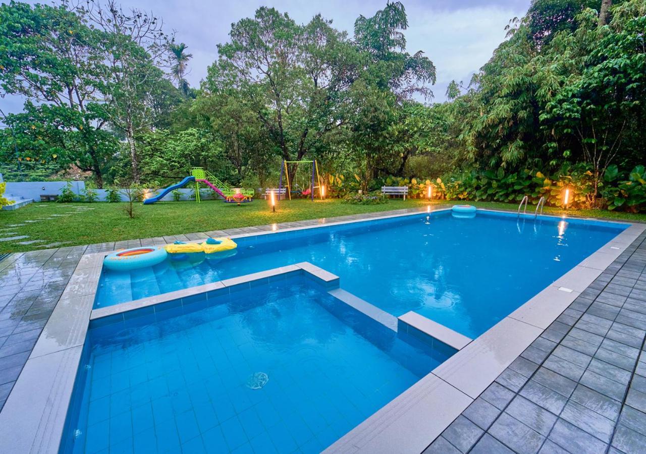 Glen Castle Vagamon Pool Resort By Voye Homes Esterno foto
