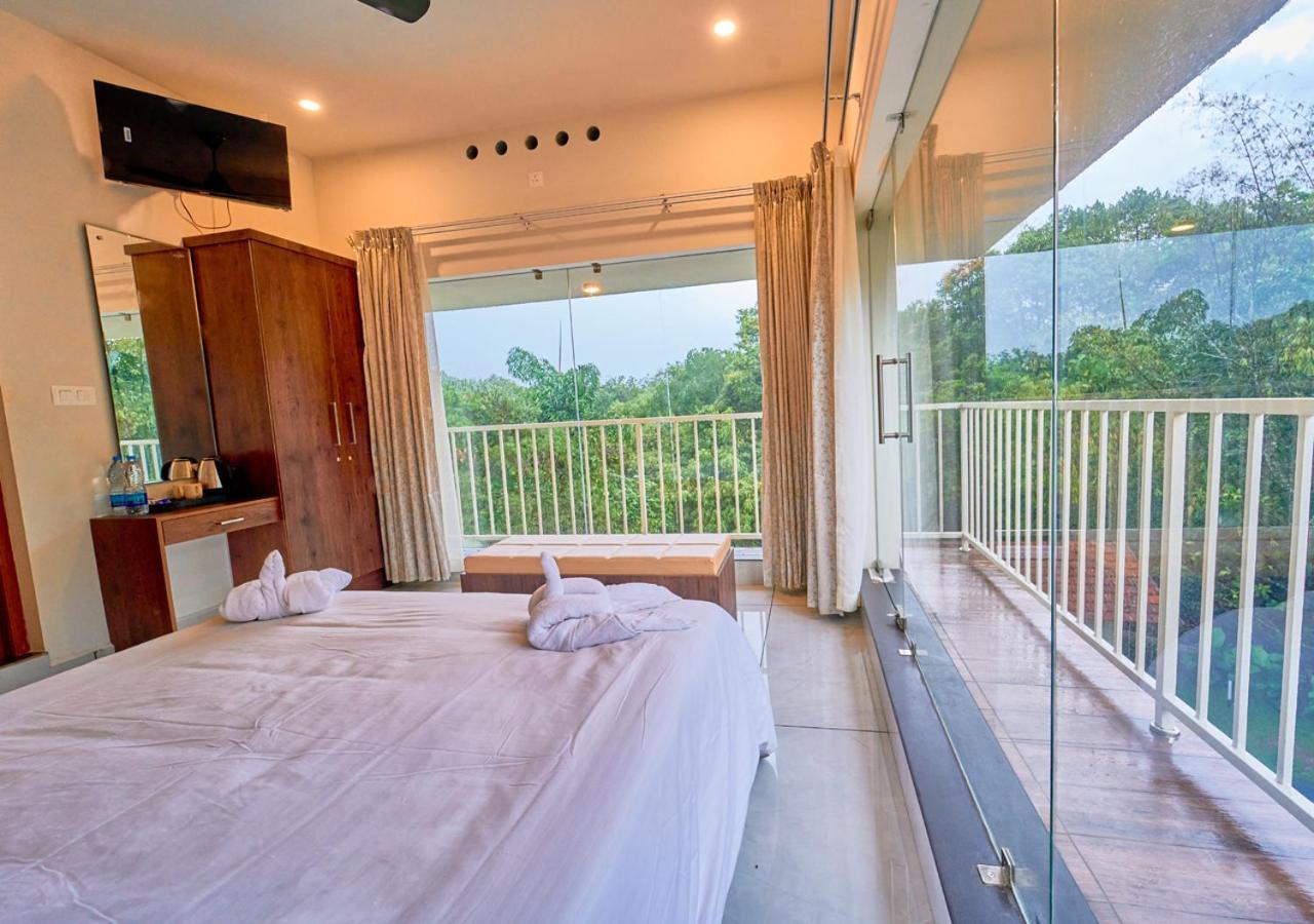 Glen Castle Vagamon Pool Resort By Voye Homes Esterno foto