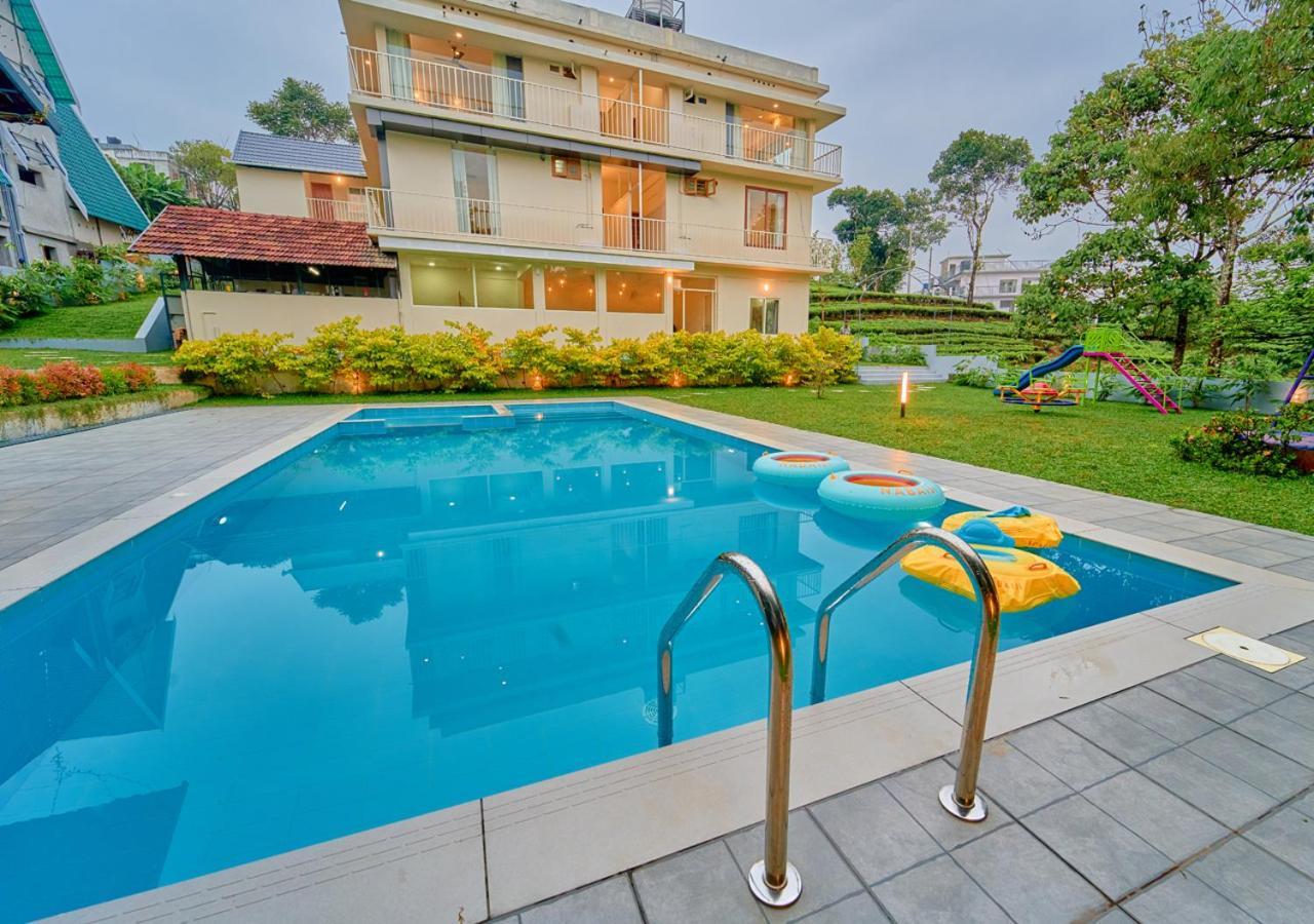 Glen Castle Vagamon Pool Resort By Voye Homes Esterno foto
