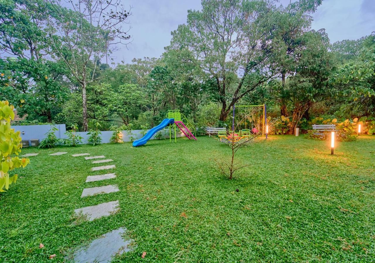 Glen Castle Vagamon Pool Resort By Voye Homes Esterno foto