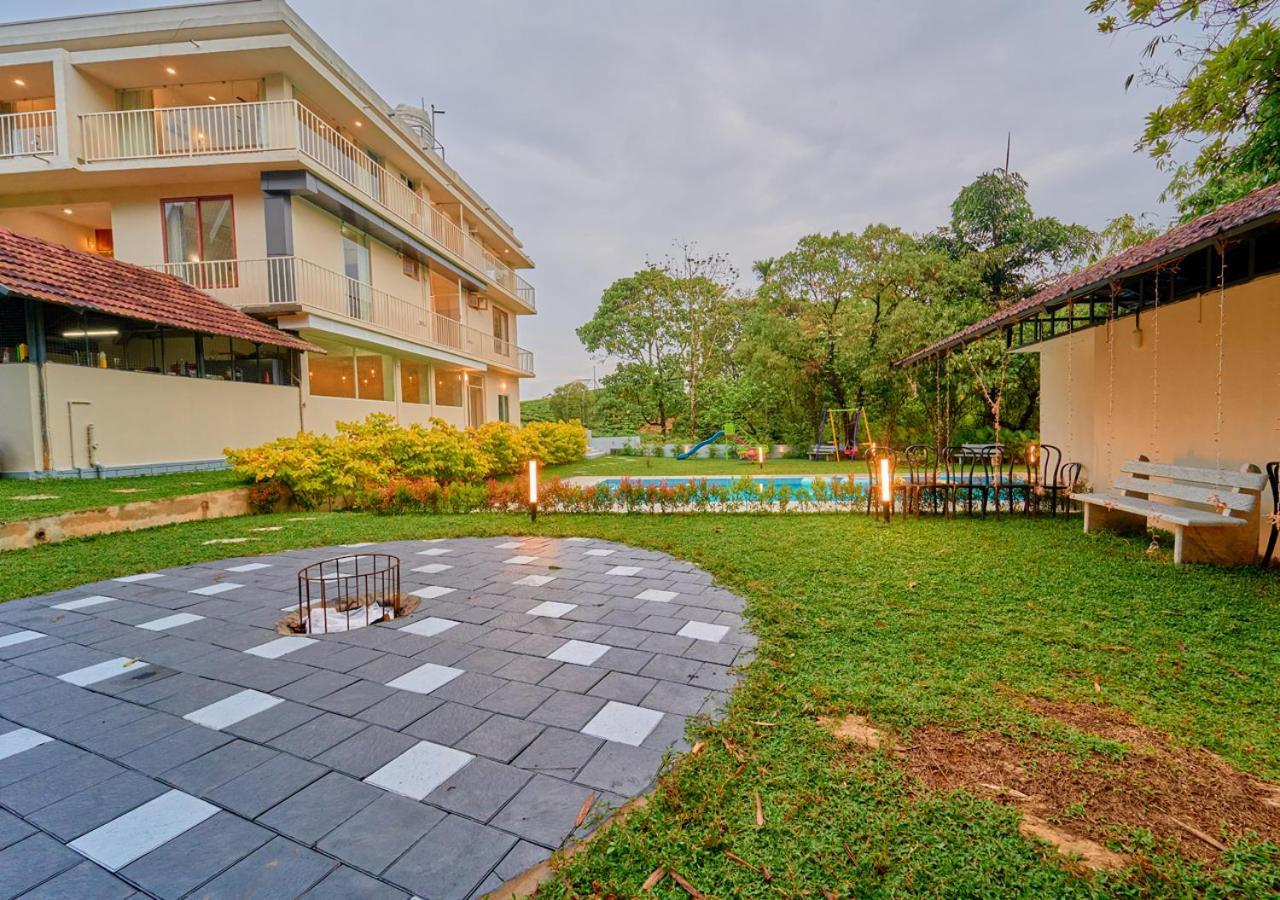 Glen Castle Vagamon Pool Resort By Voye Homes Esterno foto