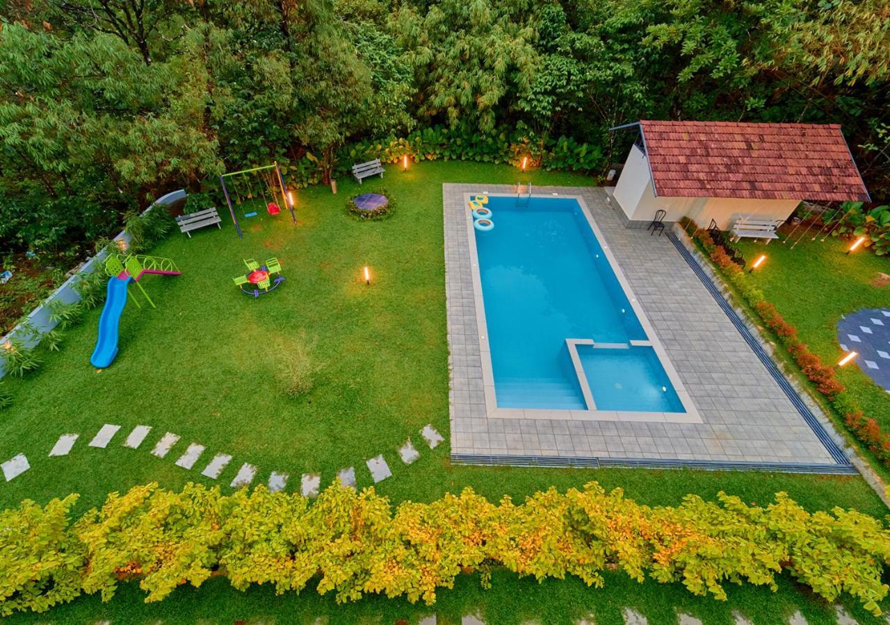 Glen Castle Vagamon Pool Resort By Voye Homes Esterno foto