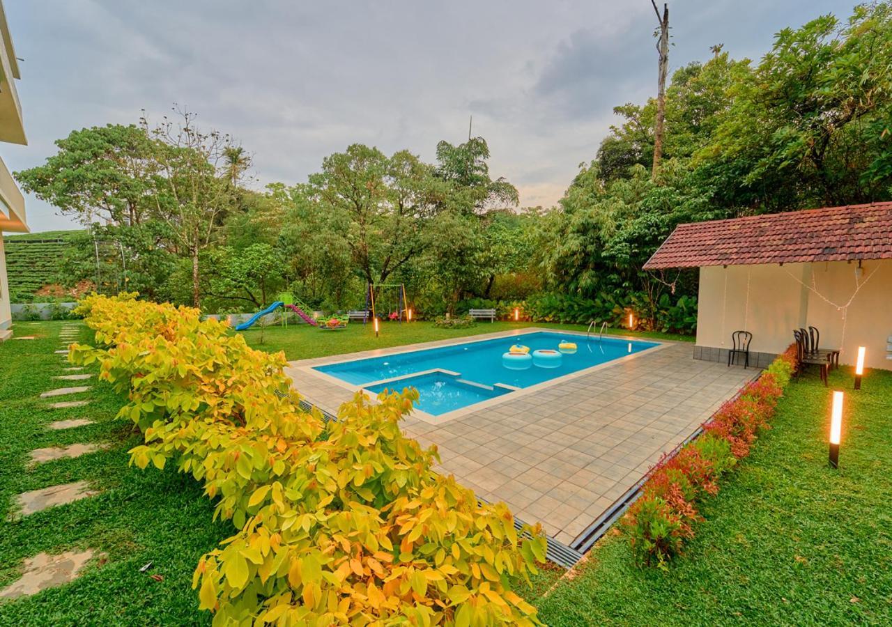 Glen Castle Vagamon Pool Resort By Voye Homes Esterno foto